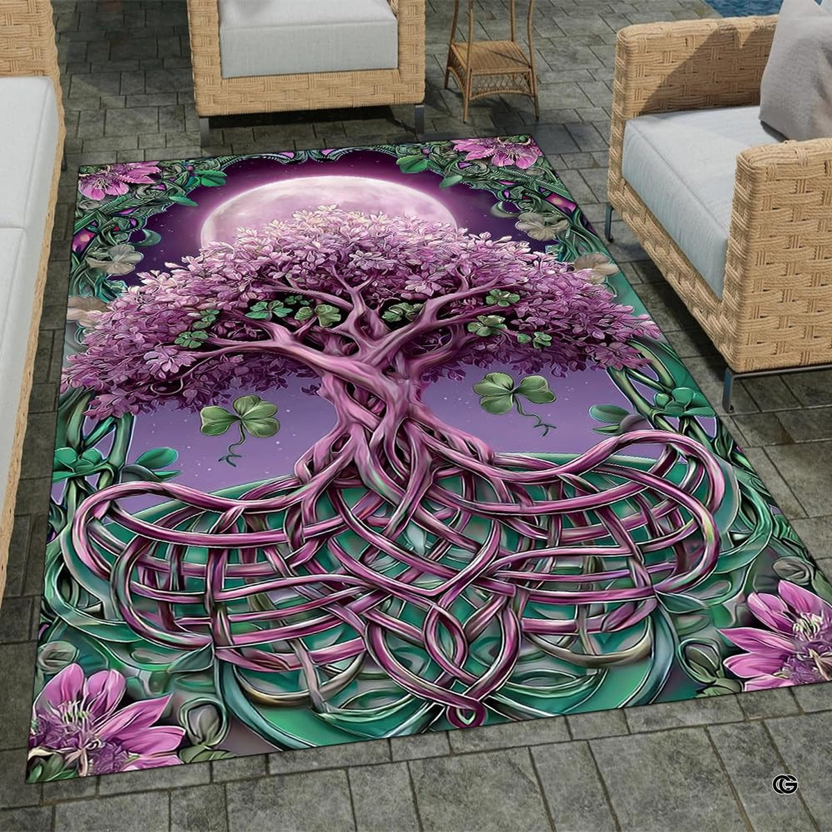 Patio stone lounge with wicker seating displaying the full moon Celtic Tree of Life area rug - image 1 of 8