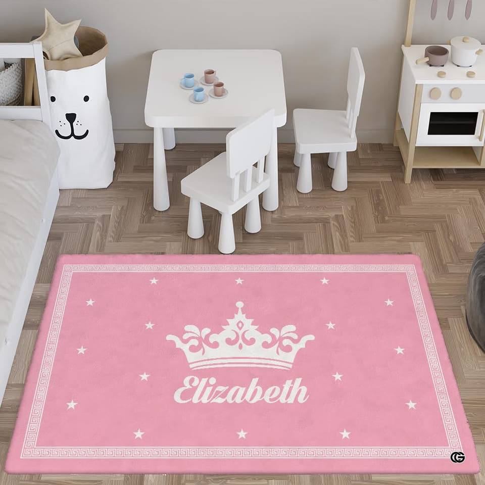 Rectangular pink Greek key rug in a bright playroom