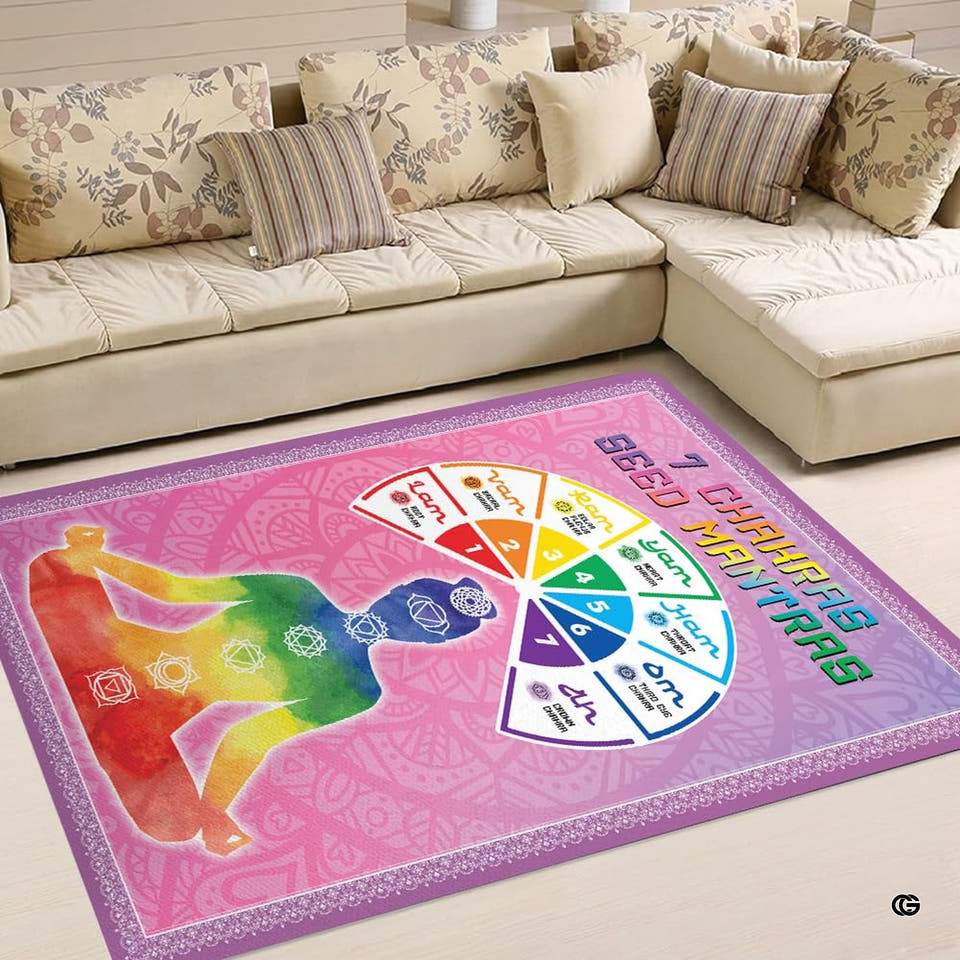 Seven energy centers yoga lotus meditation pink area rug in living room setting with couch