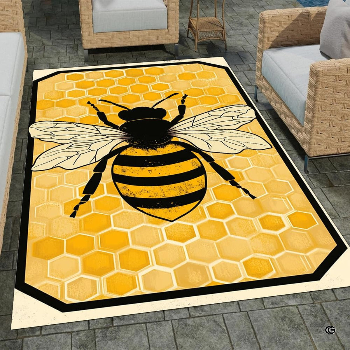 Honey bee rug hooking inspired area rug displaying centered bee artwork over golden honeycomb shapes.