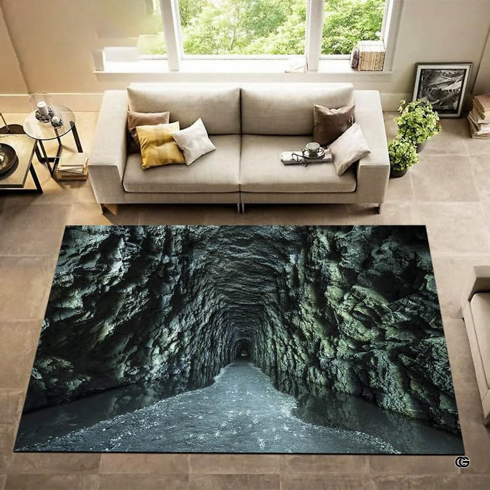 Living room overhead view showing the rectangular 3D rock cave tunnel area rug on tile flooring.