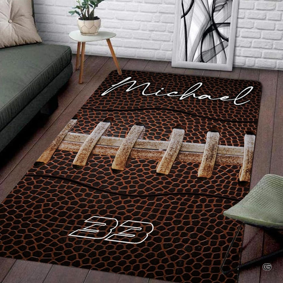 Hunting cabin area rug displaying leather grain textures and sports laces in a rustic room.