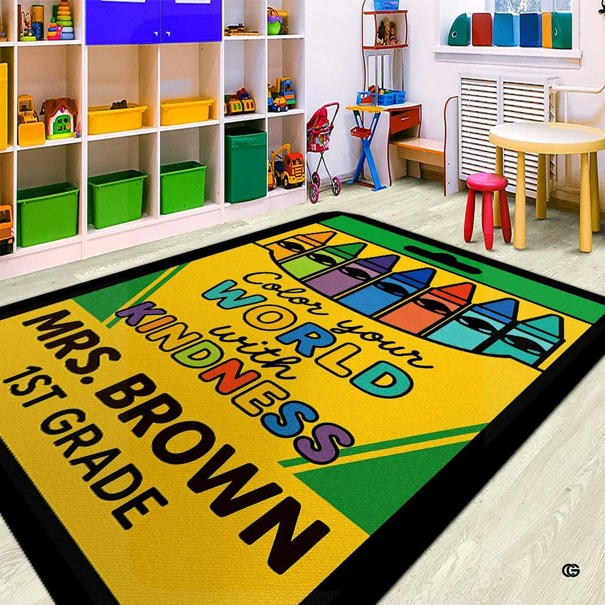 Close view of crayon tips and black oval wrapper graphics on colorful classroom area rug.