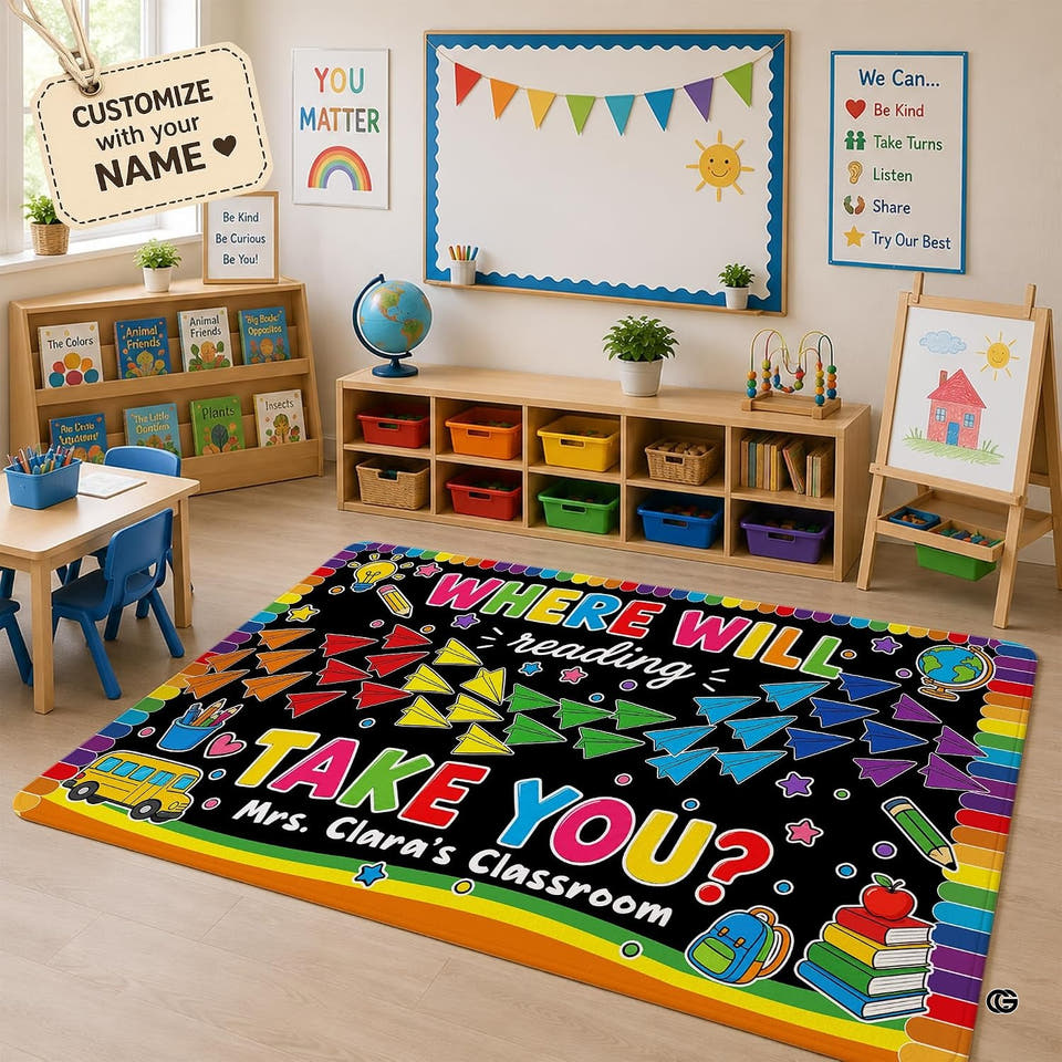 Full flat layout of rainbow paper plane schoolroom area rug featuring colorful gliders on black ground