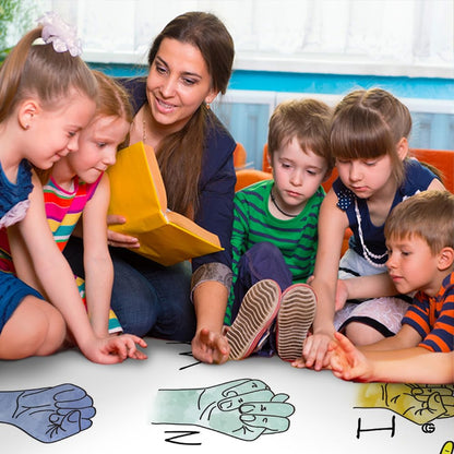 Lifestyle scene featuring teacher and students gathered on educational area rug. - thumbnail image 5 of 8