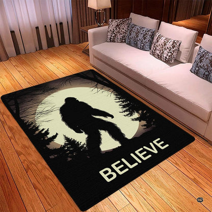 Close-up of pine tree silhouettes and radiant night sky graphics on a neutral rug. - thumbnail image 3 of 5