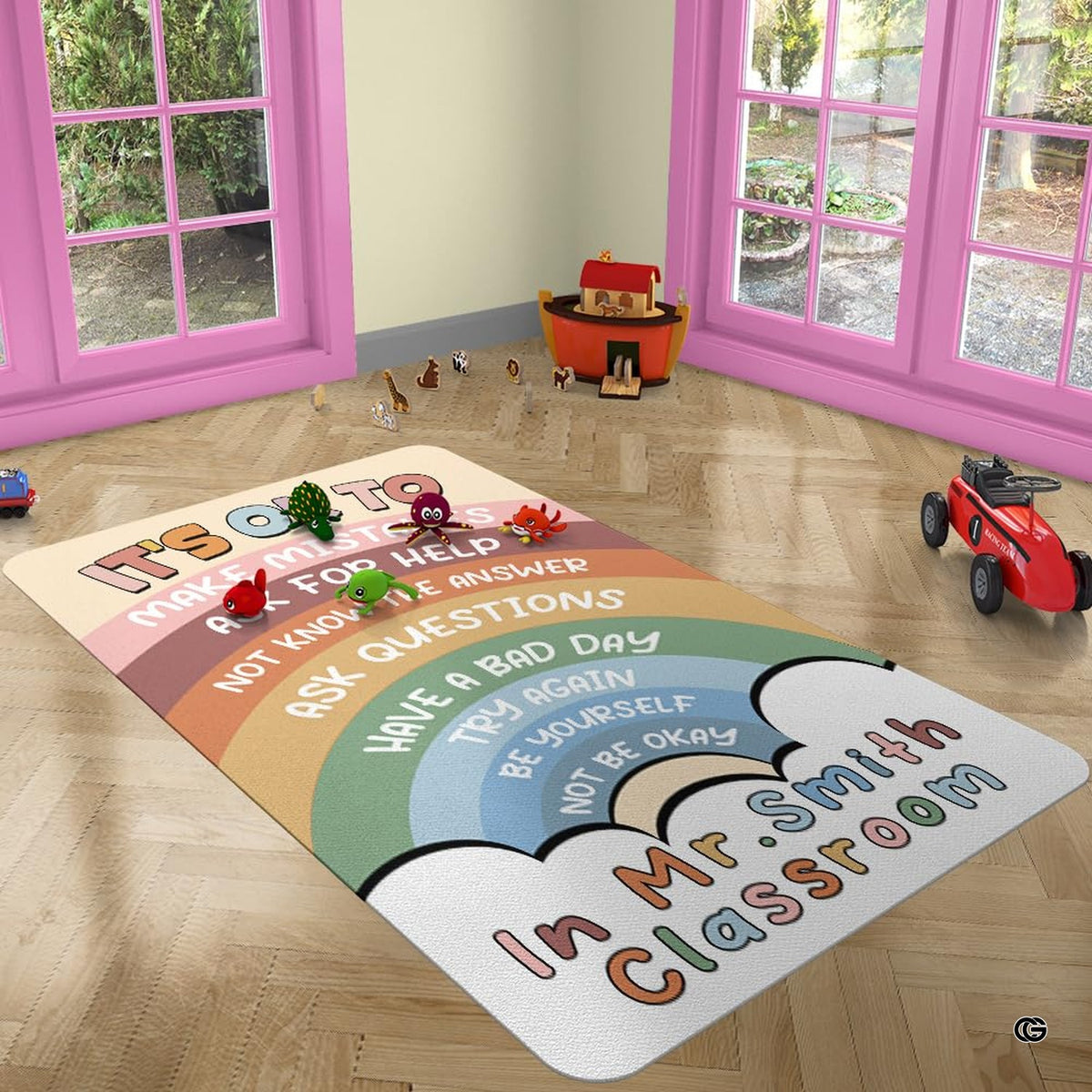 Playroom interior with toys and bay windows featuring the classroom affirmations rug
