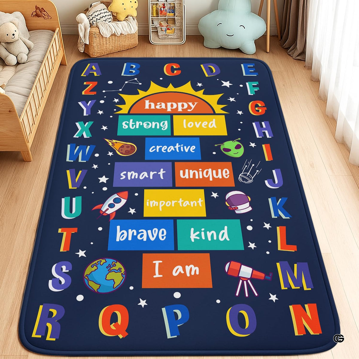 Space decorative accent area rug featuring colorful alphabet border, rocket, planets, and stars on navy blue background.