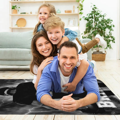 Sports fan cave layout displaying the thunderstorm football rug on hardwood flooring - thumbnail image 5 of 7