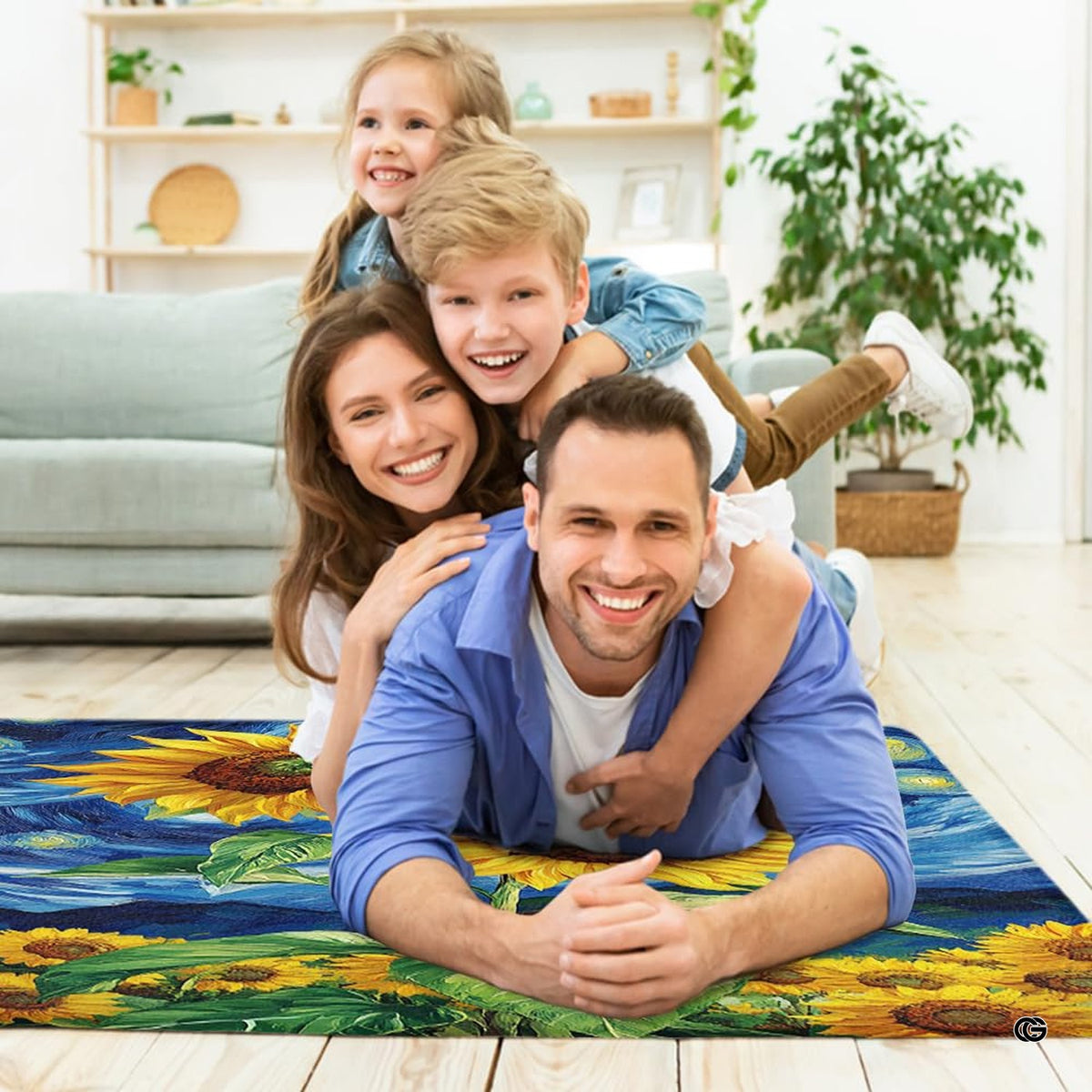 Lifestyle living room scene featuring family lounging on starry night sunflower area rug. - image 5 of 7