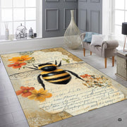 Overhead layout view of the rectangular antique botanical bee manuscript area rug - thumbnail image 7 of 8