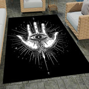 Bound area rug showcasing Hamsa art placed beneath a contemporary coffee table. - thumbnail image 7 of 8