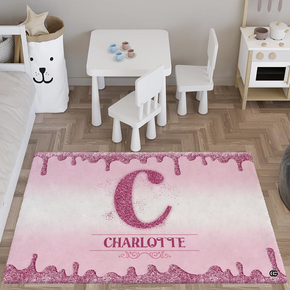 Pink glitter drip rug in a bright playroom