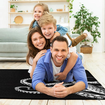 Monochrome octopus tentacles area rug styled on hardwood flooring in living room. - thumbnail image 4 of 7