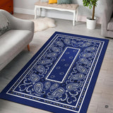 Classic navy blue bandana paisley print living room area rug with crisp white borders