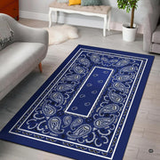 Classic navy blue bandana paisley print living room area rug with crisp white borders - thumbnail image 1 of 9
