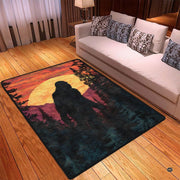 Close up artistic detail of Bigfoot silhouette set against radiant orange sky and glowing golden sunset tones. - thumbnail image 3 of 5