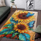 Blue butterfly mat showing bright azure wings resting on golden sunflowers with amber watercolor hues.