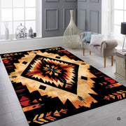 Angle display of earth-toned tribal geometric floor rug highlighting sharp black and orange contrast. - thumbnail image 6 of 7