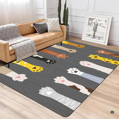 Top view of cat paw area rug displaying colorful tabby, calico, and tuxedo paws. - thumbnail image 2 of 5