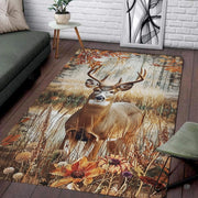 Whitetail buck deer with antlers standing in golden autumn meadow grass and wildflowers on an area rug - thumbnail image 1 of 7