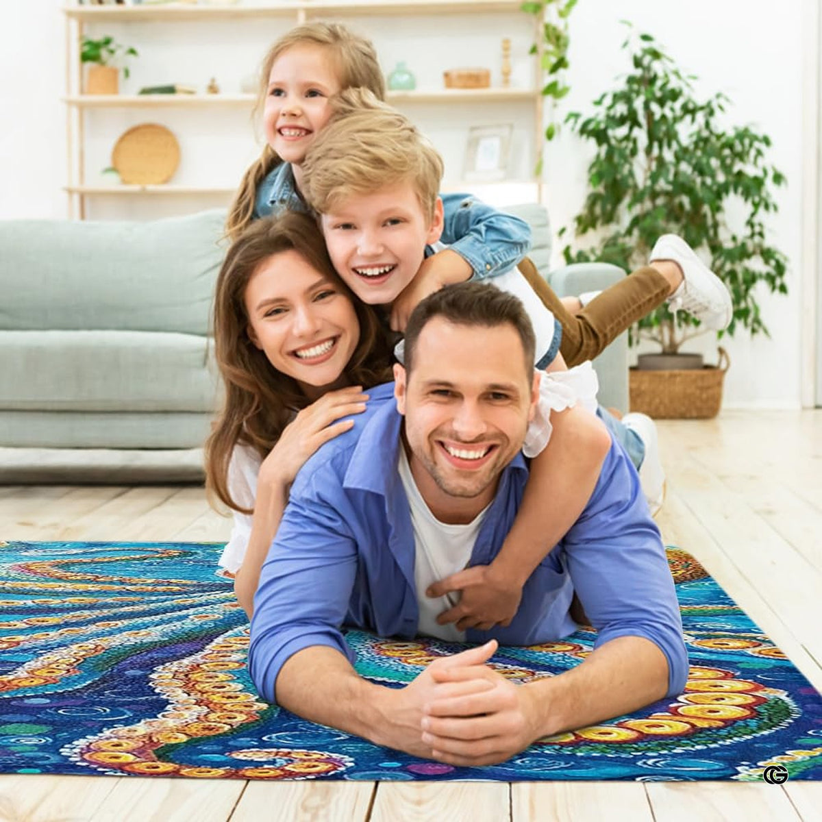 Overhead perspective of dynamic painterly brushstrokes depicting an octopus on an ocean creature rug.