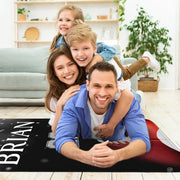 Overhead view of gridiron-themed floor decor featuring dark black backdrop and glowing arena bokeh lighting accents. - thumbnail image 5 of 7