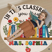 Educational circular area rug accenting a modern study room floor surrounded by neutral decor. - thumbnail image 5 of 7