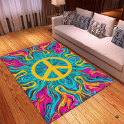 Close up view of psychedelic marbled tie-dye swirls surrounding bright yellow central peace emblem. - thumbnail image 3 of 5