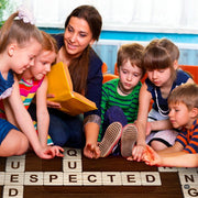 Academic crossword tile floor accent surrounded by globe, pencil, scissors, and red apple graphics. - thumbnail image 6 of 8