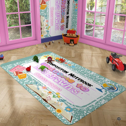 Green marbled composition notebook classroom area rug with welcome teacher banner and floral school motifs. (Angle 5) - thumbnail image 5 of 8