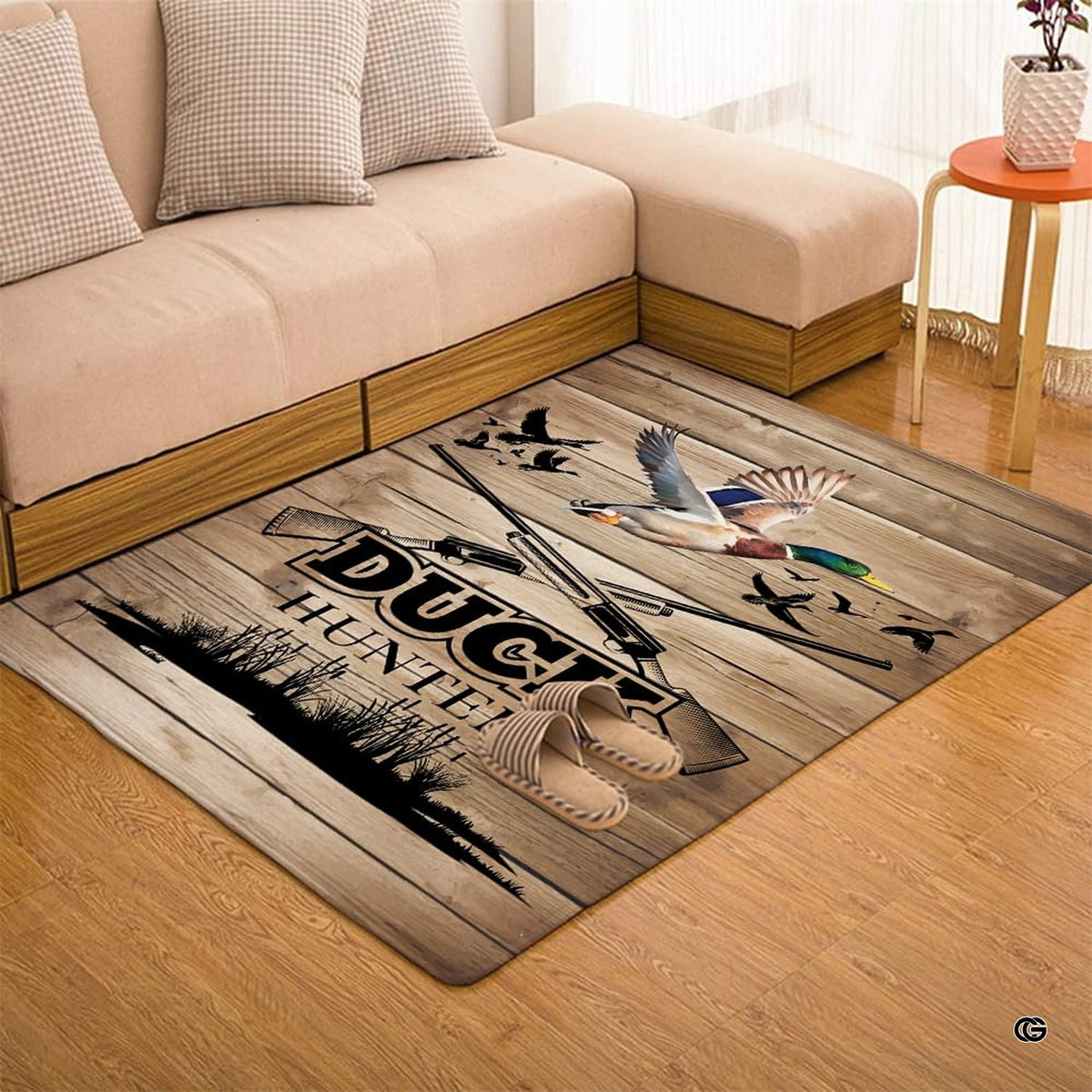 Angled view highlighting the timber plank pattern on a waterfowl wood look area rug.