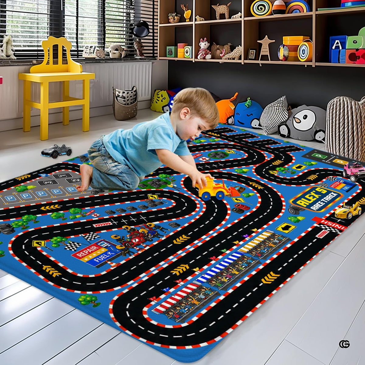 Overhead layout displaying winding raceway curves and traffic flags on floor rug - image 4 of 9