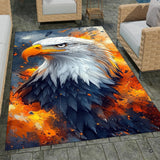Majestic bald eagle area rug featuring glowing amber splatter and navy plumage in a stylish room.
