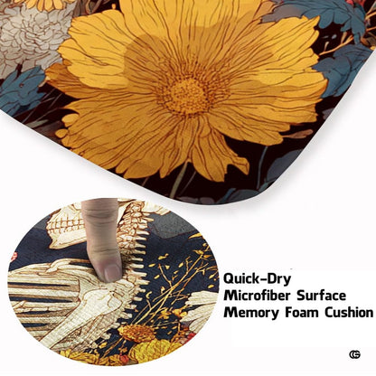 Detailed closeup of the printed floral blossoms and skull artwork on the area rug - thumbnail image 5 of 8
