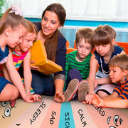 Close-up of emotion wheel rug highlighting clean bordered decorative accent and playful facial expressions. - thumbnail image 5 of 9