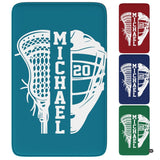 Lacrosse sports area rug featuring split stick head and helmet graphic display in bright room setting.