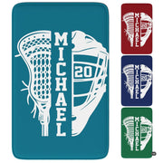 Lacrosse sports area rug featuring split stick head and helmet graphic display in bright room setting. - thumbnail image 1 of 9