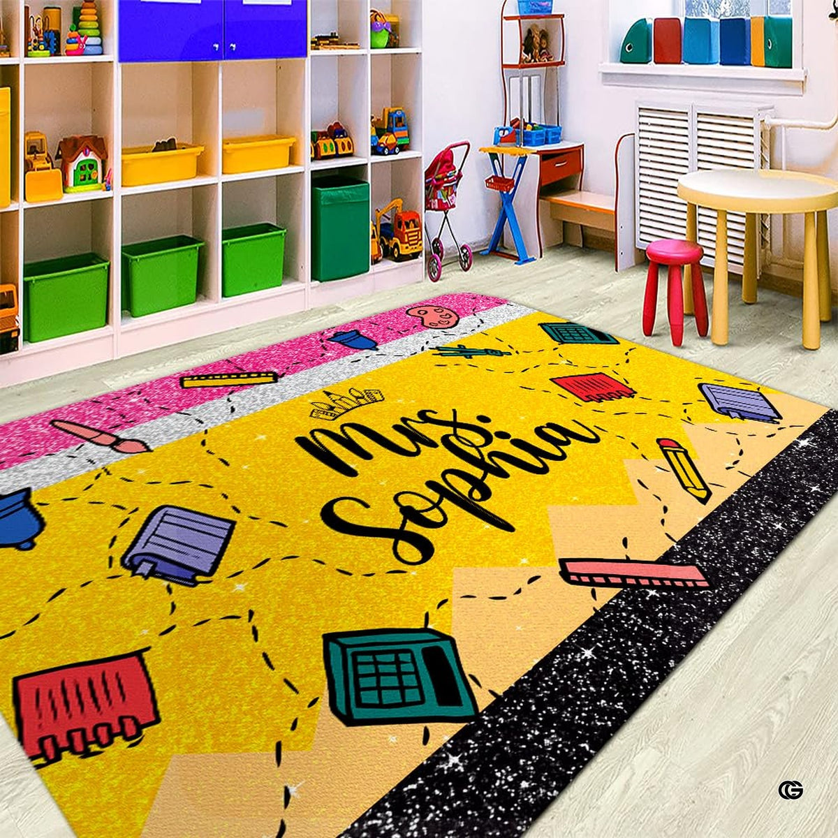 Preschool classroom play area with storage bins displaying the yellow pencil teacher area rug