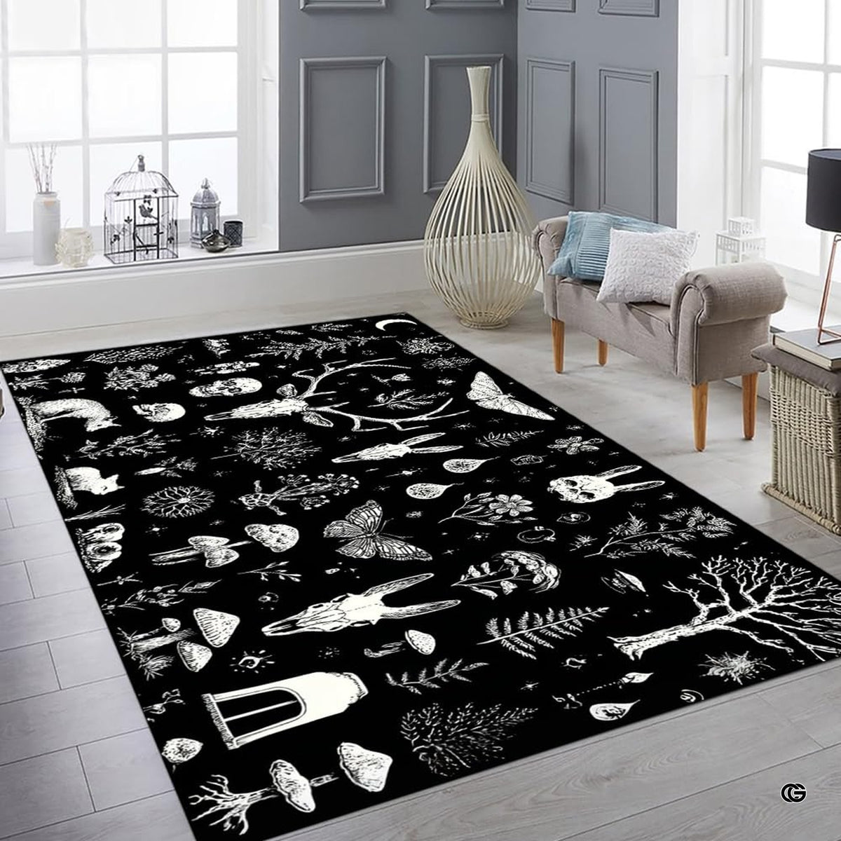 Sunlit living space mockup showcasing the black and white gothic botanical rug laid flat between furniture