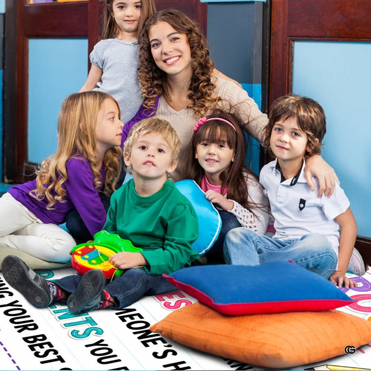 Non-slip grip backing texture and resilient construction of educational area rug.
