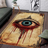 Large gothic area rug with mystical weeping eye artwork and ornate sepia filigree border in living room.