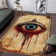 Large gothic area rug with mystical weeping eye artwork and ornate sepia filigree border in living room. - thumbnail image 1 of 7