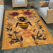 Vintage Honey Bee Area Rug highlighting a central bumblebee illustration and golden honeycomb backdrop. - thumbnail image 1 of 8