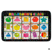 Classroom floor setting featuring an educational geometric shapes chart area rug on wood flooring - thumbnail image 1 of 9