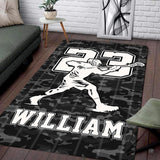 Monochrome lacrosse player graphic with jersey number 23 on an athletic sports area rug.
