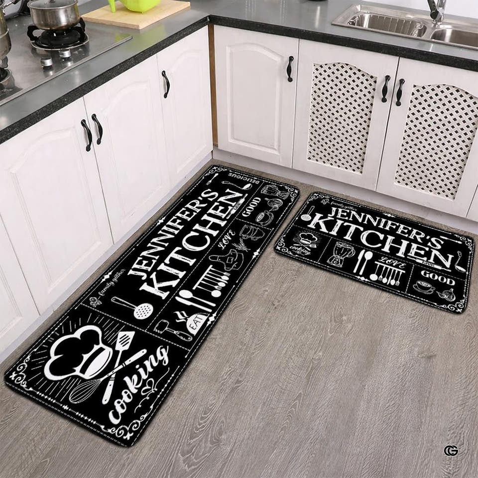 Chalkboard culinary art area rug displaying chef hat, ladle, and pot illustrations over a deep dark backdrop.
