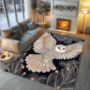 Detailed border illustration showing cream leaves and amber botanicals framing the barn owl carpet. - thumbnail image 7 of 8