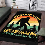 Living room setup with hardwood floor and white brick wall showcasing retro bigfoot mom squatchy area rug - thumbnail image 1 of 5