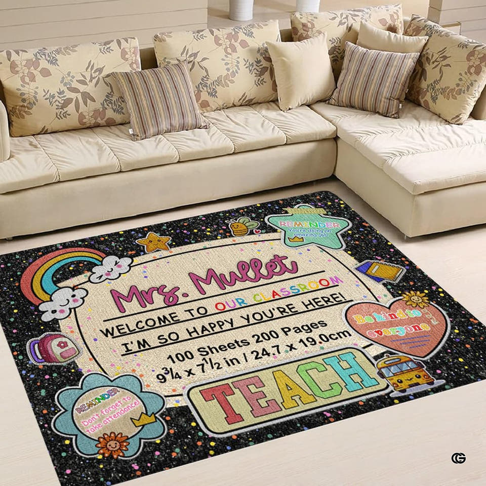 Classroom area rug featuring retro schoolhouse graphics, a rainbow, and a central notebook badge on black confetti.
